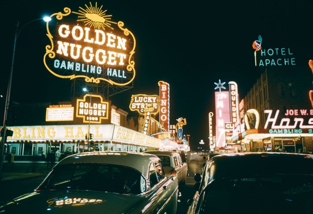 General view of Downtown Las Vegas from Fremont Street looking at the Golden Nugget Gambling Hall, The Mint, Pioneer Club, Lucky Strike, The Las Vegas Club and The Hotel Apache circa 1958