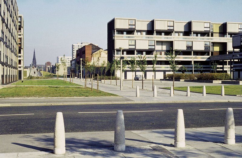 View along Hulme Walk towards All Saints, with Royce Road in the foreground and Ribchester Walk beyond