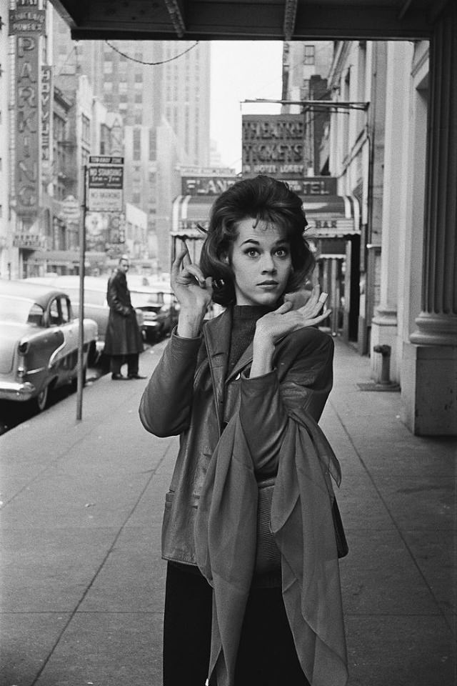 Jane Fonda posing near the entrance to the Cort Theatre.