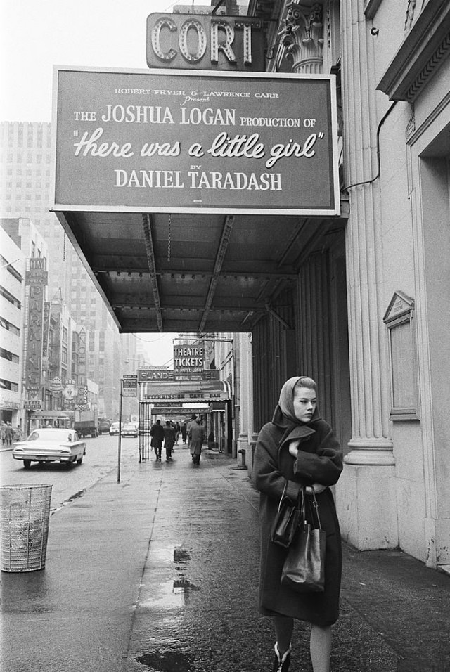 Jane Fonda walking down 48th Street, the Cort Theatre where her play 'There was a Little Girl' is playing.