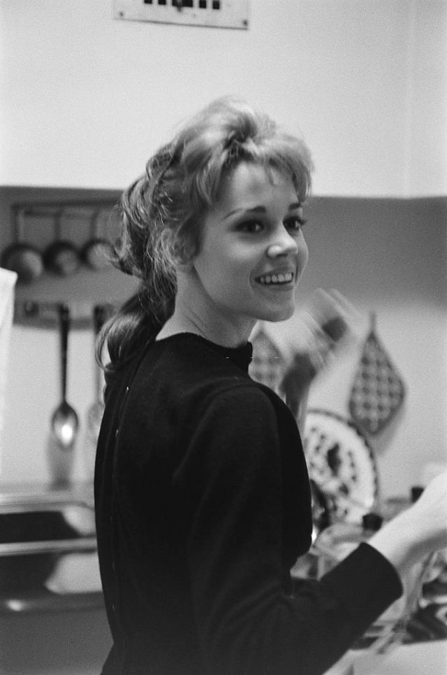 Jane Fonda smiling in her kitchen.