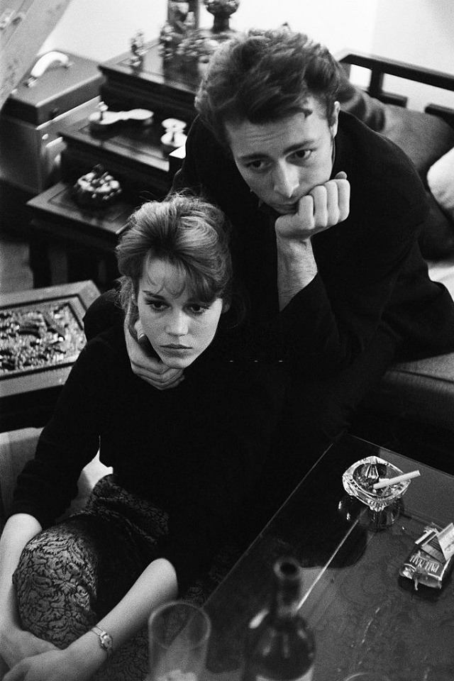 Jane Fonda sitting in the dining room with a friend.