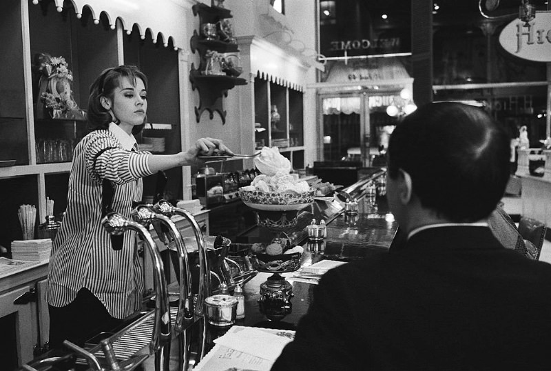 Jane Fonda preparing a cup of ice-cream for a client at Hicks & Son.