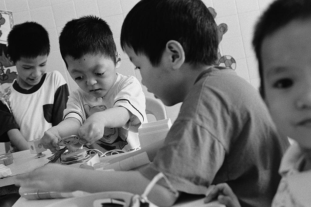 Boys play at the Peace Village at Tu Du hospital in Ho Chi Minh City, 2005