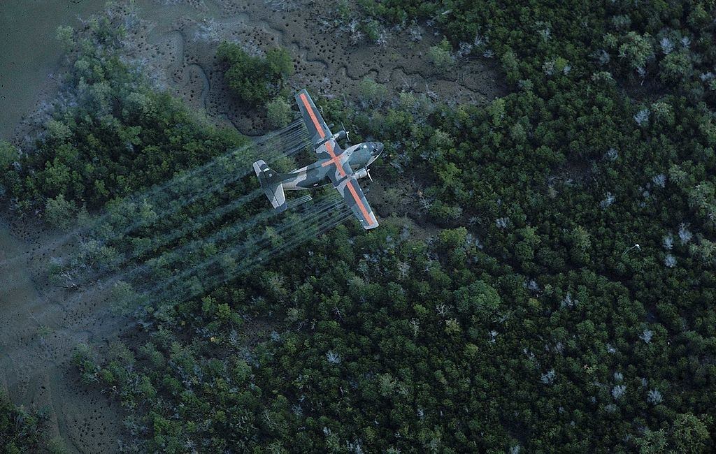 USAF UC 123K plane spraying dioxin-tainted herbicide/defoliant Agent Orange, in Vietnam war defensive measure, 1970