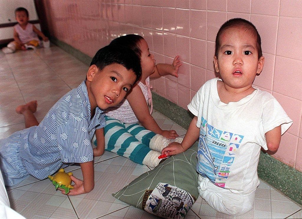 Disabled and malformed children, all from agent orange infected parents, 1998
