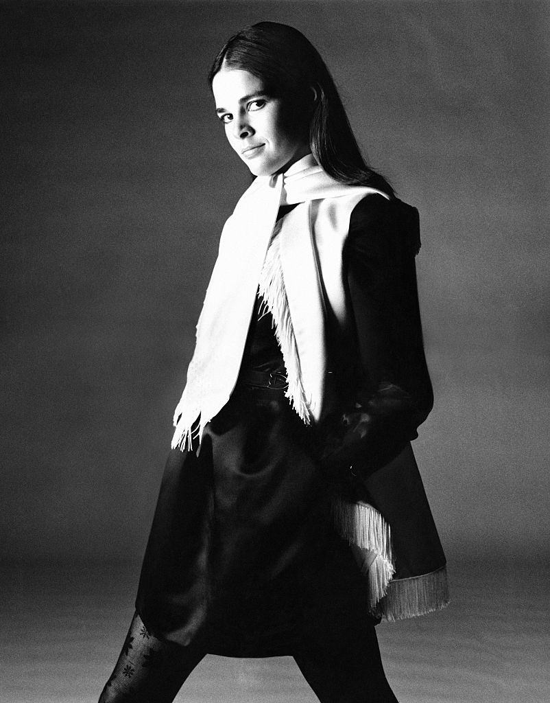 Ali MacGraw in a black satin mini shirtdress, Vogue 1969.