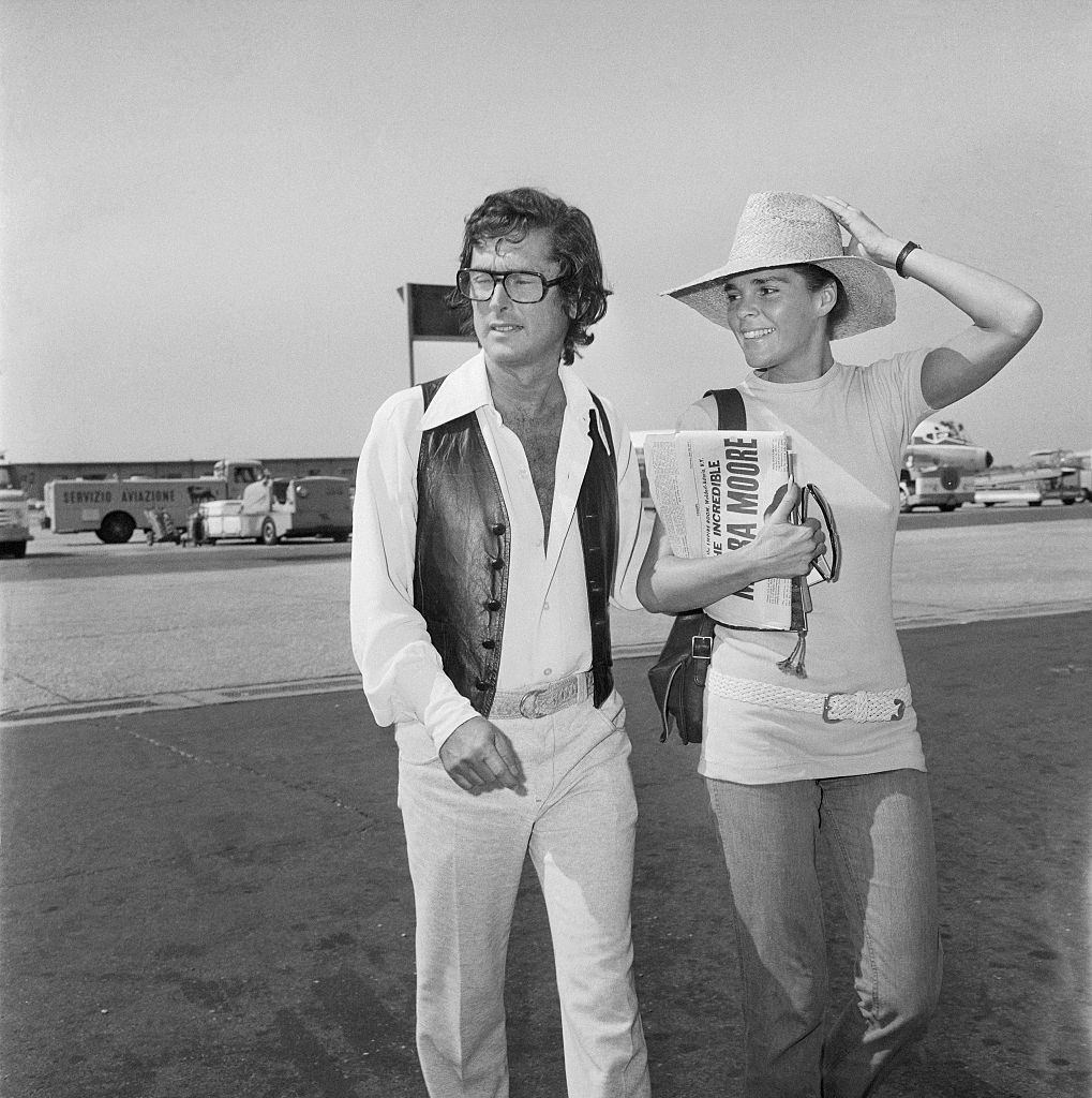 Ali MacGraw with her Husband Robert Evans at Airport, 1971