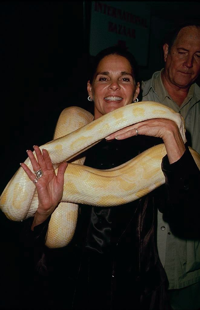 Ali Mac Graw with a python, 1990.