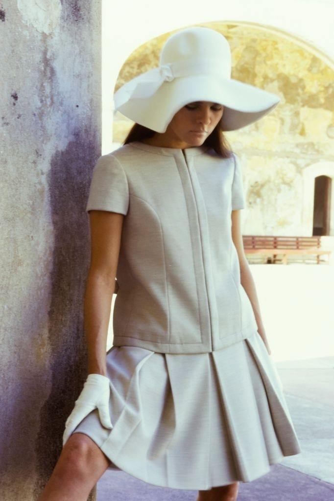 Ali MacGraw in a white zippered jersey suit, 1968.