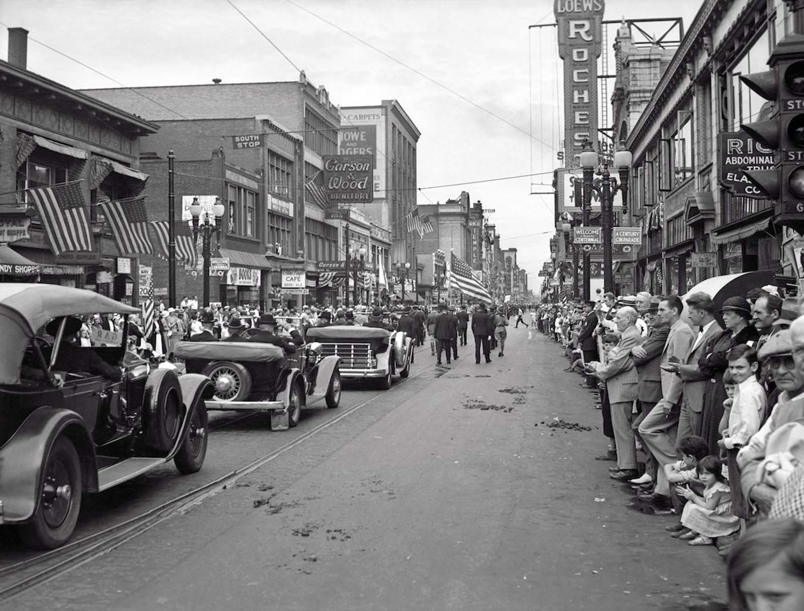 Rochester, New York — The Grand Army of the Republic Civil War Veterans join a parade down main street during Rochester’s centennial. 1934.