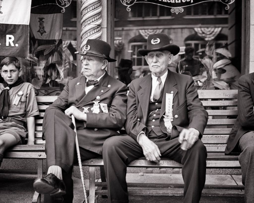 Two GAR Civil War Veterans from Kansas at the parade, 1920s.