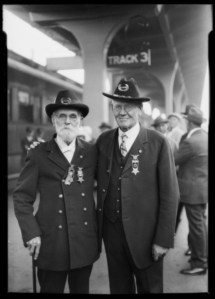 Two members of the Grand Army of the Republic fraternal organization of veterans of the US Civil War at Southern Pacific station, 1926