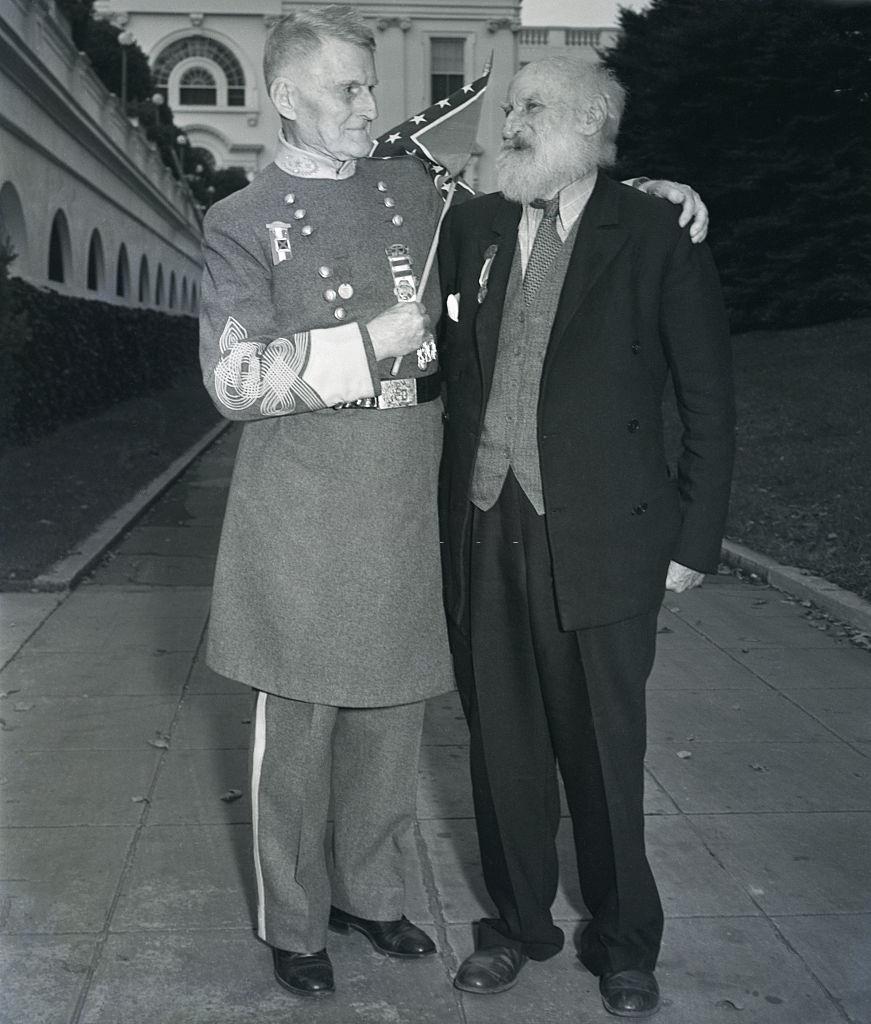 95-year-old Commander-in-Chief, Gen. Julius F. Howell (right), of Bristol, with Gen. Howell is 124-year-old Major James Monroe, Jr of Jacksonville.