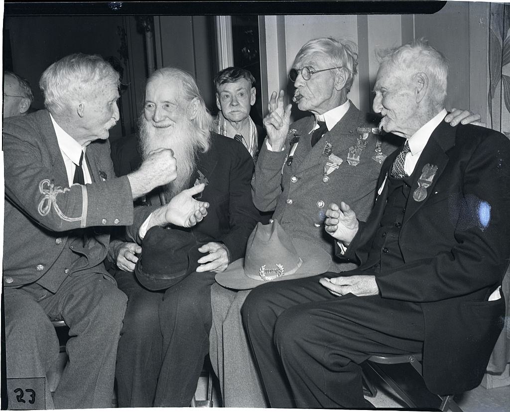 (left to right) Captain William Banks of Houston, Private A. T. Fuller, 93, of DuBuch, R.P. Scott, 93, of Dallas and Riggan, 98, of Warren, NC, at the Golden Reunion of the United Confederate Veterans