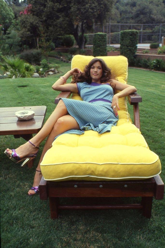 Barbi Benton relaxing in the garden, 1979.