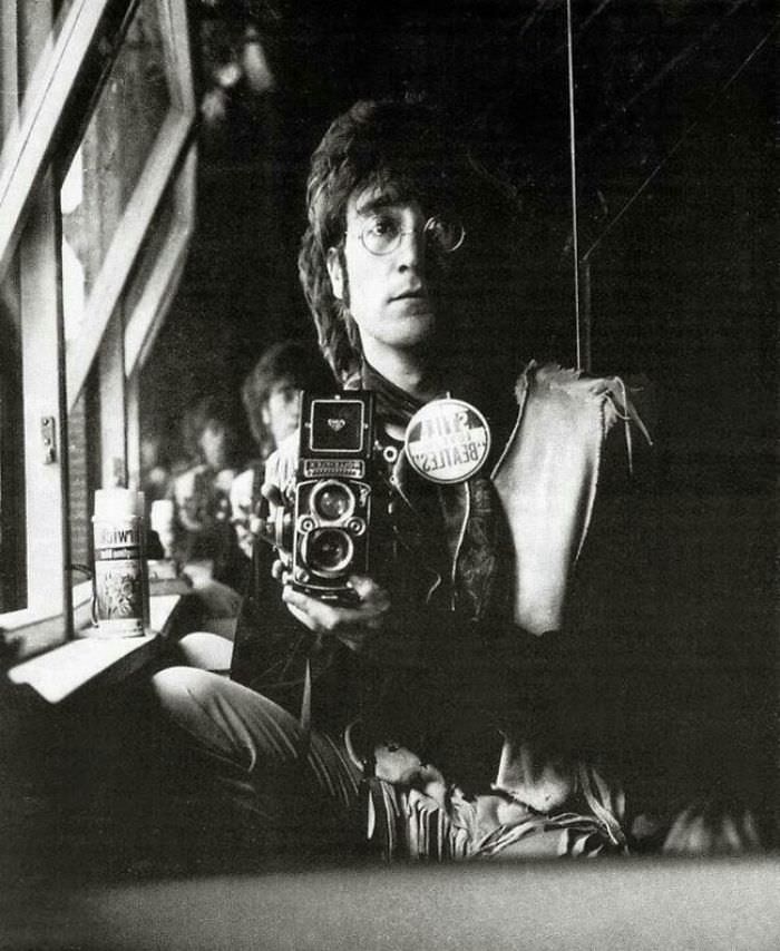 John Lennon taking a selife, 1967