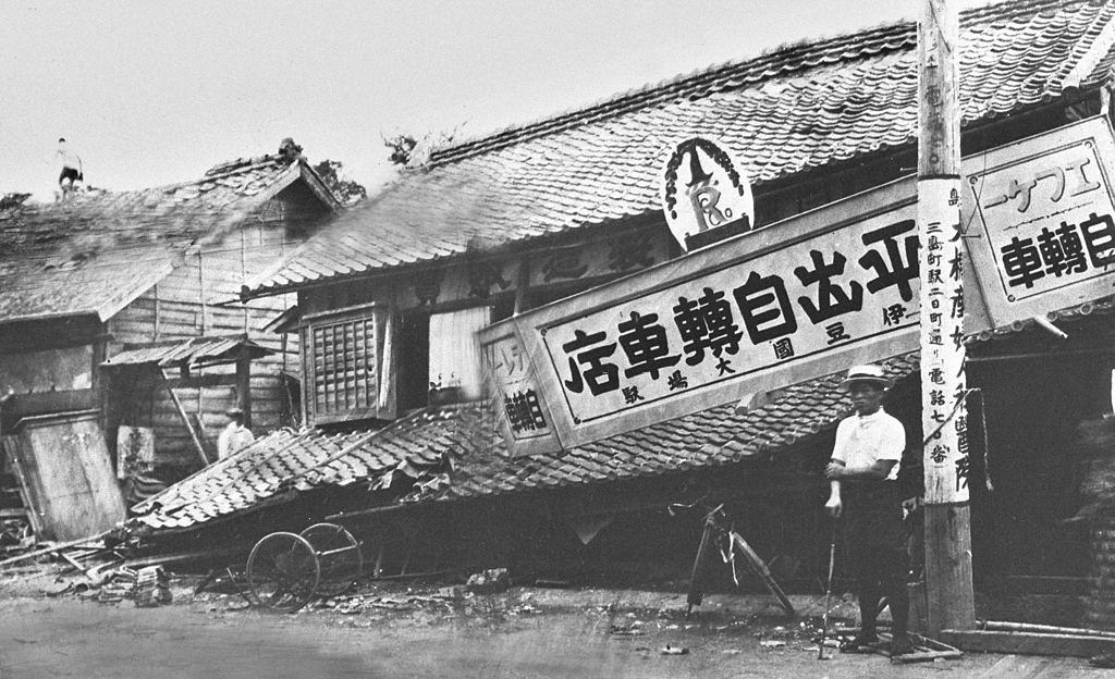 A bicycle shop is squished by the Great Kanto Earthquake in September 1923.