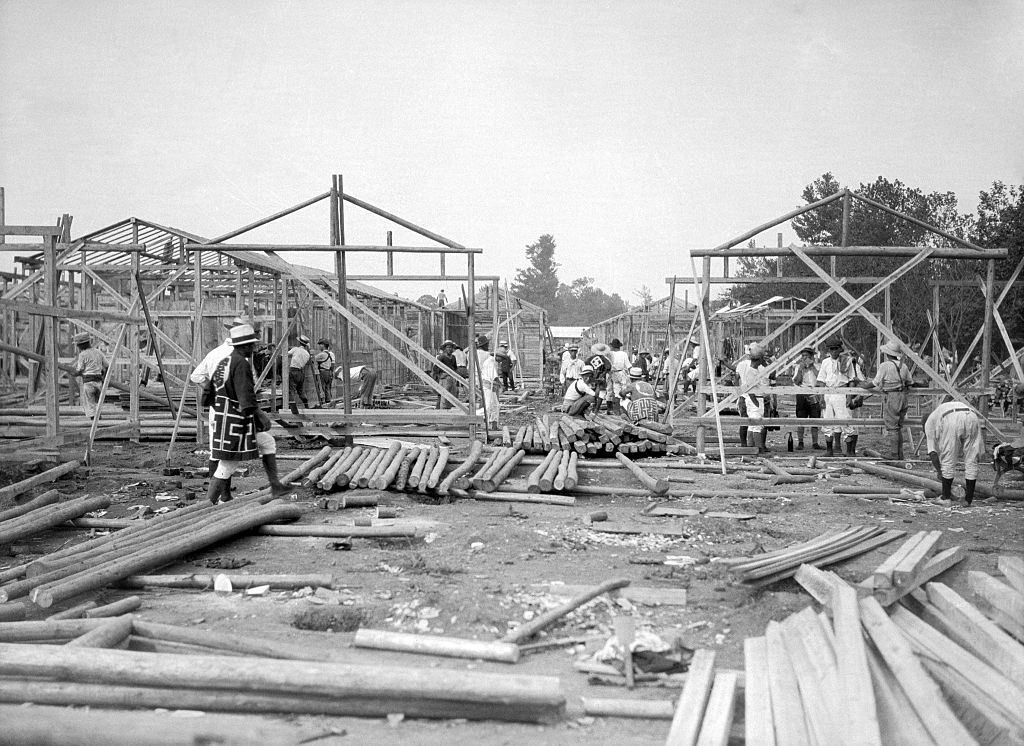 Japanese Villagers rebuilding village after the earthquake in Japan, 1923.