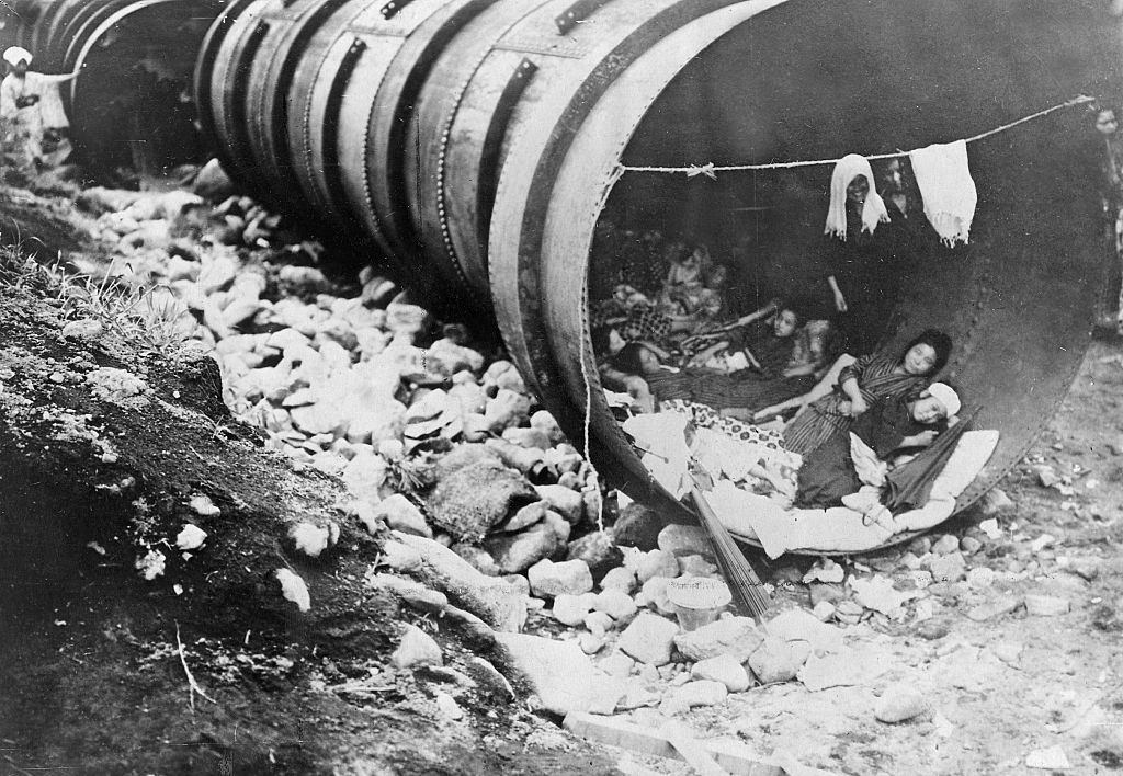 People taking refuge in sewers near Yokohama after the devastating Kanto Earthquake, 1923.