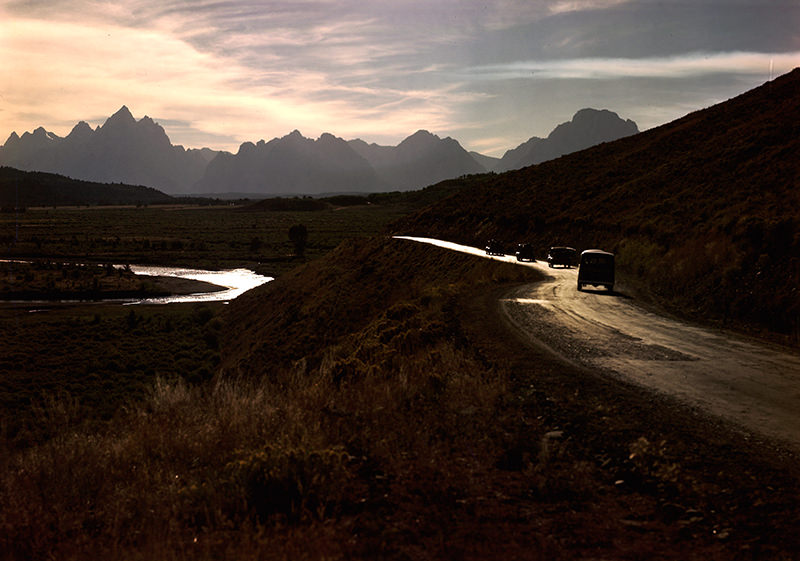 Entering Jackson Hole from the east along the Blackrock Creek with the Grand Tetons in the background. Jackson Hole, Wyoming, 1948.