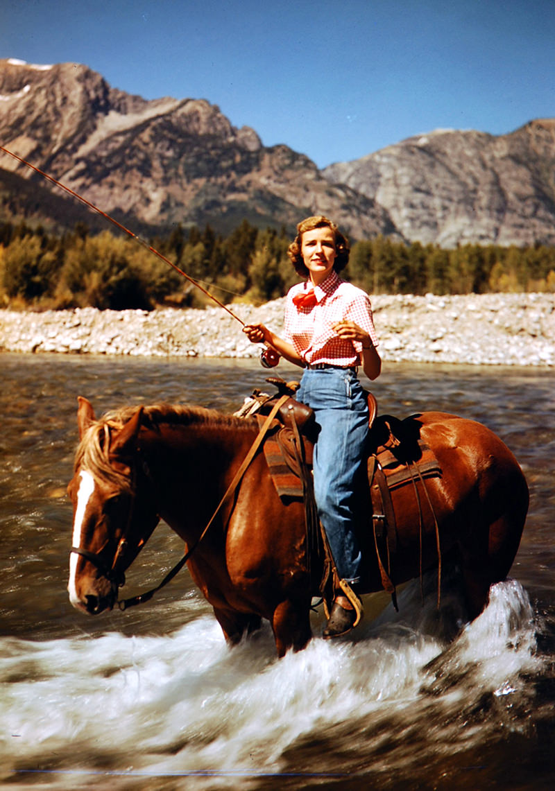 Esther Allen riding a horse in Jackson Hole Valley, Wyoming, 1948.