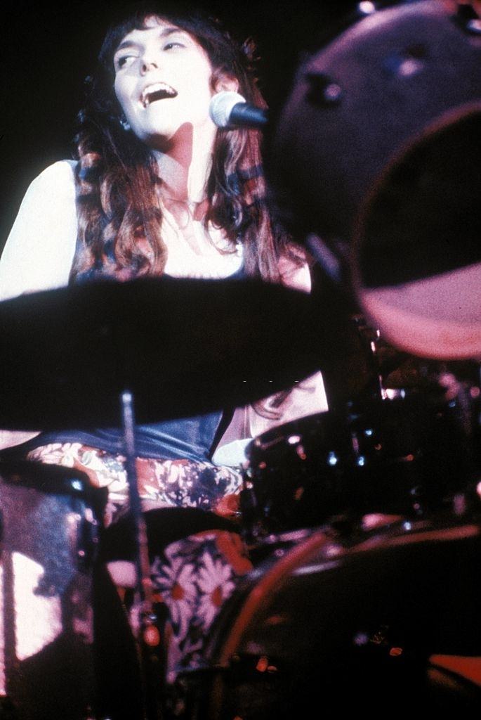 Karen Carpenter performing on stage.