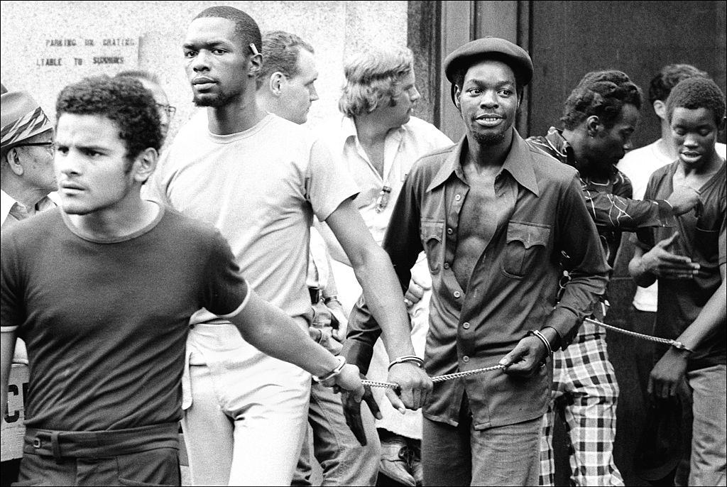 Handcuffed men who were arrested for looting during the blackout, New York City, 1977.