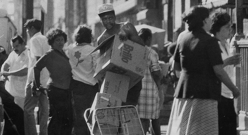 Looters in Spanish Harlem during the 1977 blackout power failure, New York City, 1977.