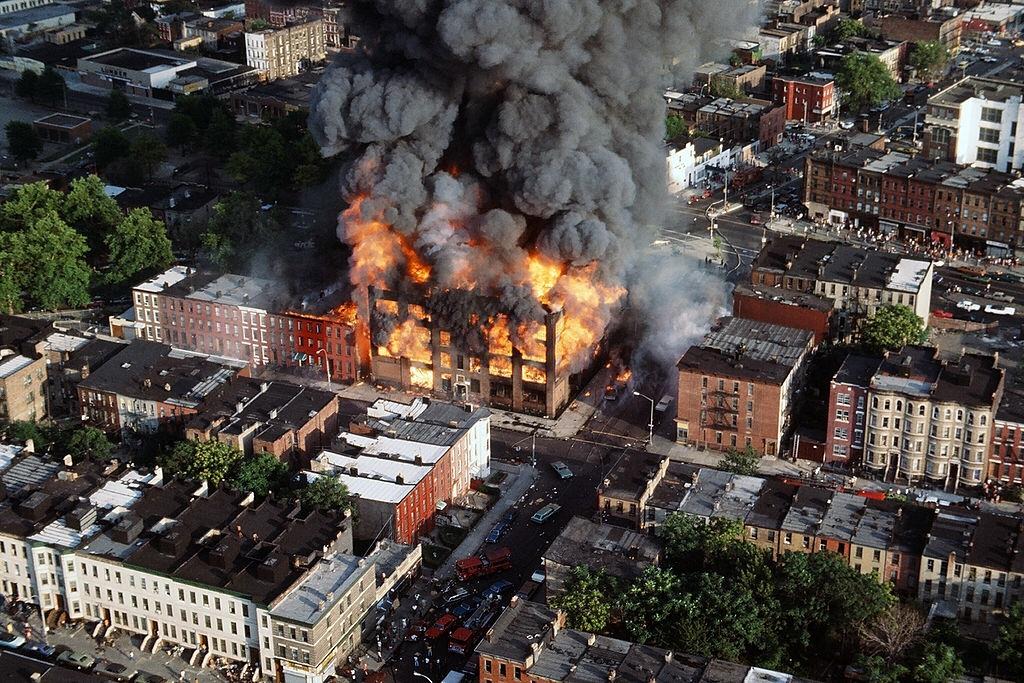 Aerial view of a building burning in the wake of the New York City blackout, Brooklyn, New York City, 1977.