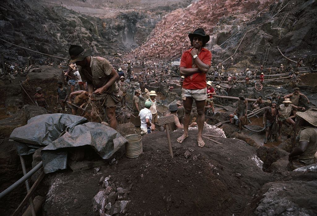 A man oversees a mining plot at the bottom of the Serra Pelada gold mine, Brazil.