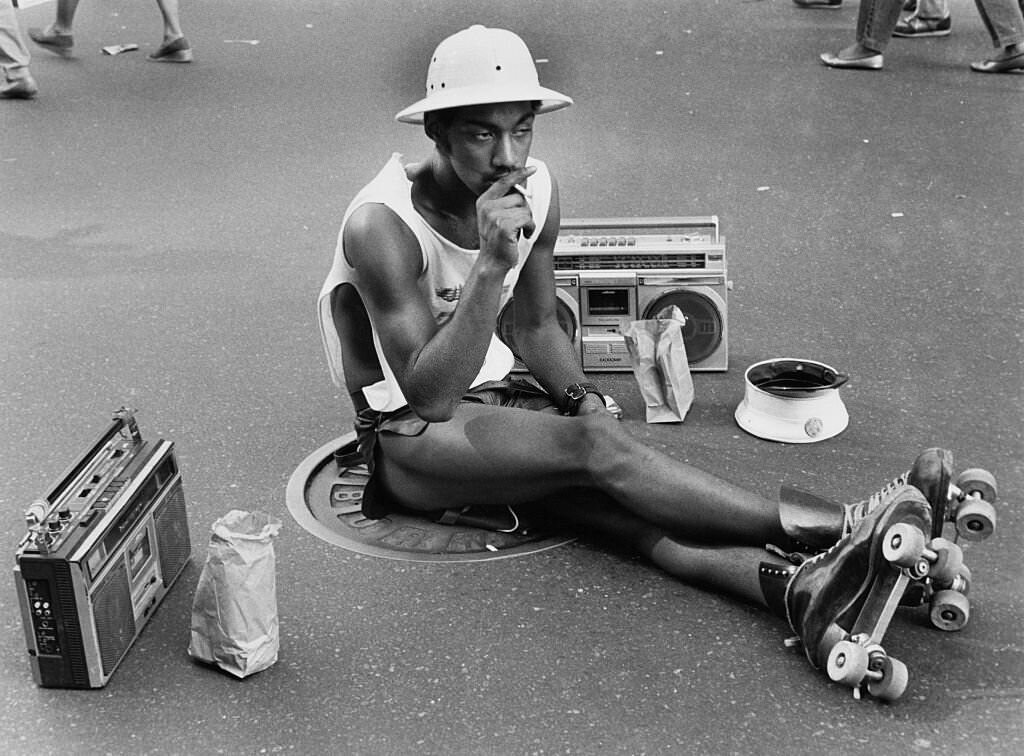 A young man in roller skates and a pith helmet, New York City