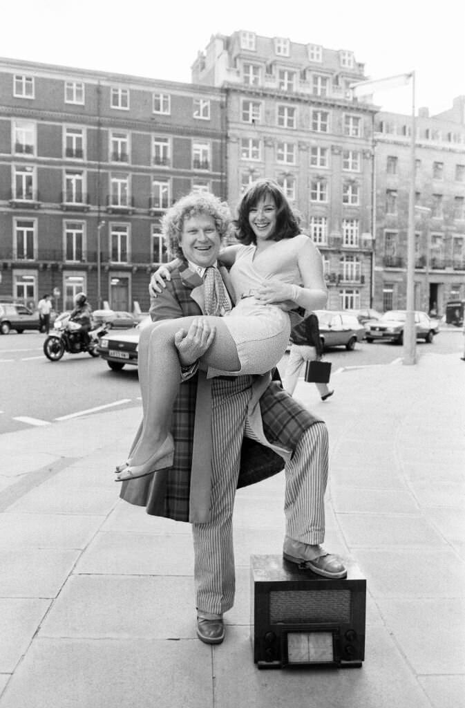 Actor Colin Baker with his assistant Nicola Bryant and boombox, July 1985