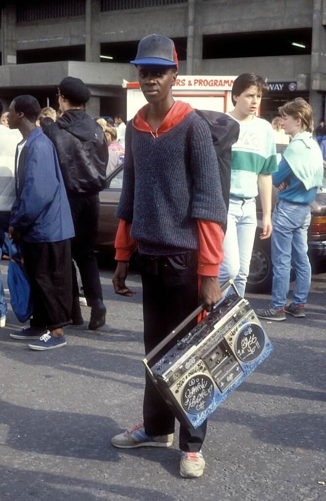 A black teenager with a customised ghetto blaster at UK Fresh Hip Hop event, Wembley, 1986