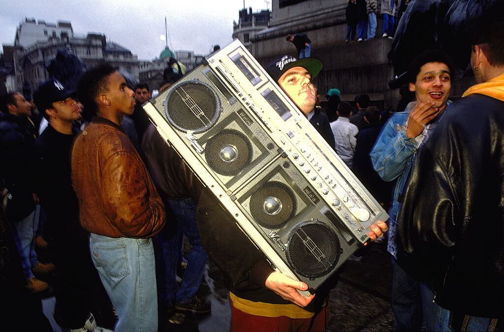 Protestor at 'Freedom to Party' demonstration carrying a large boombox, 1989