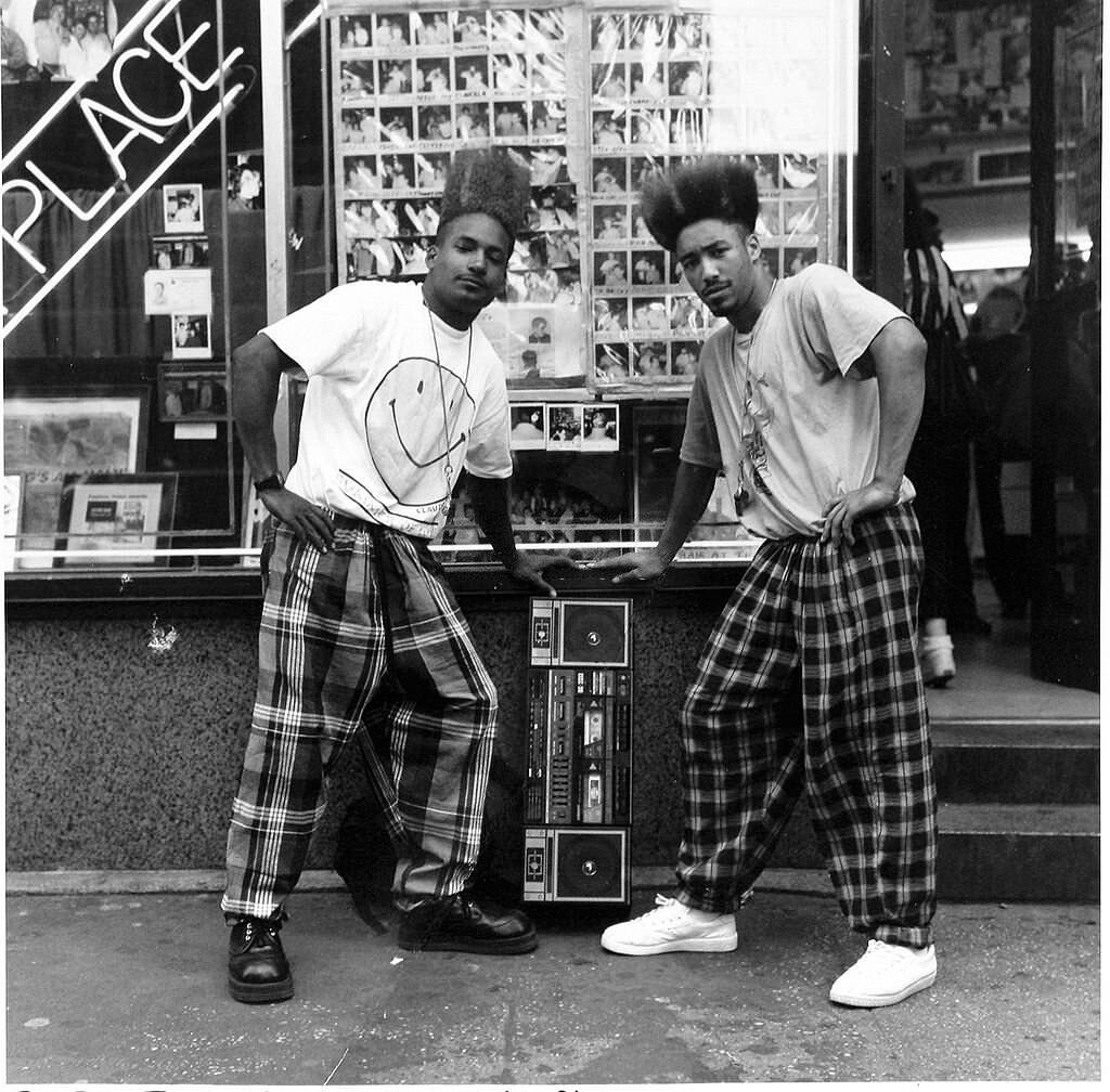 The rap duo Twin Towers pose outside the popular Astor Place, 1989