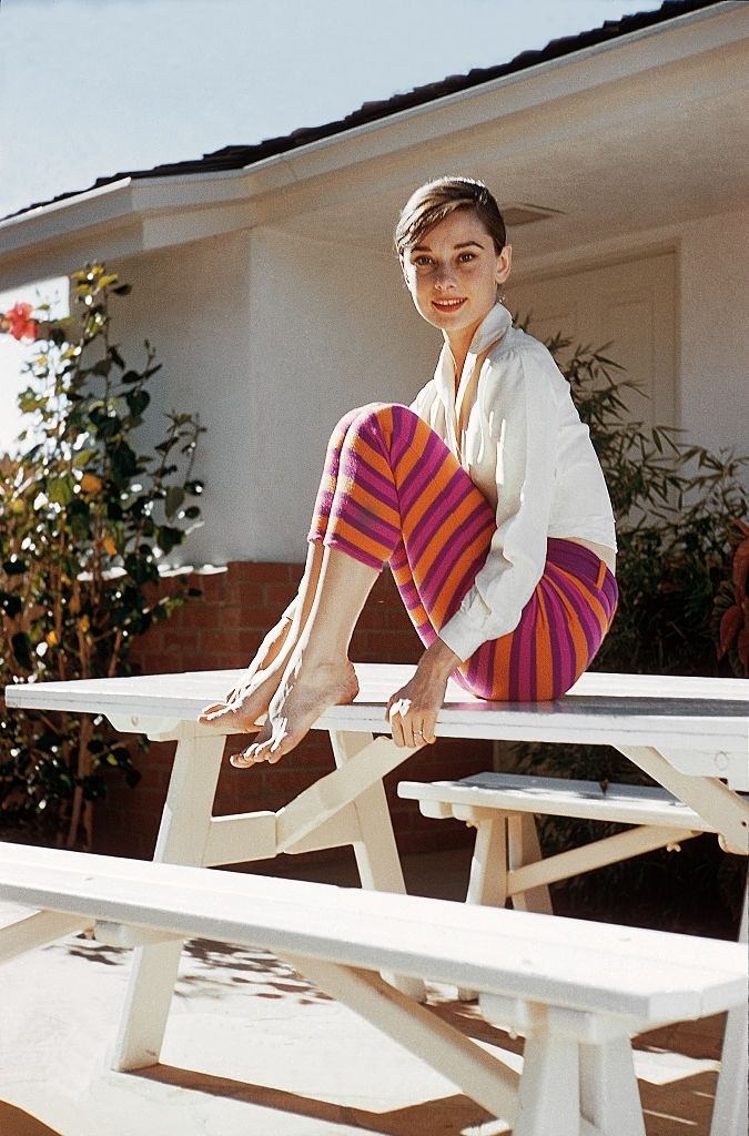Audrey Hepburn relaxing in her house.
