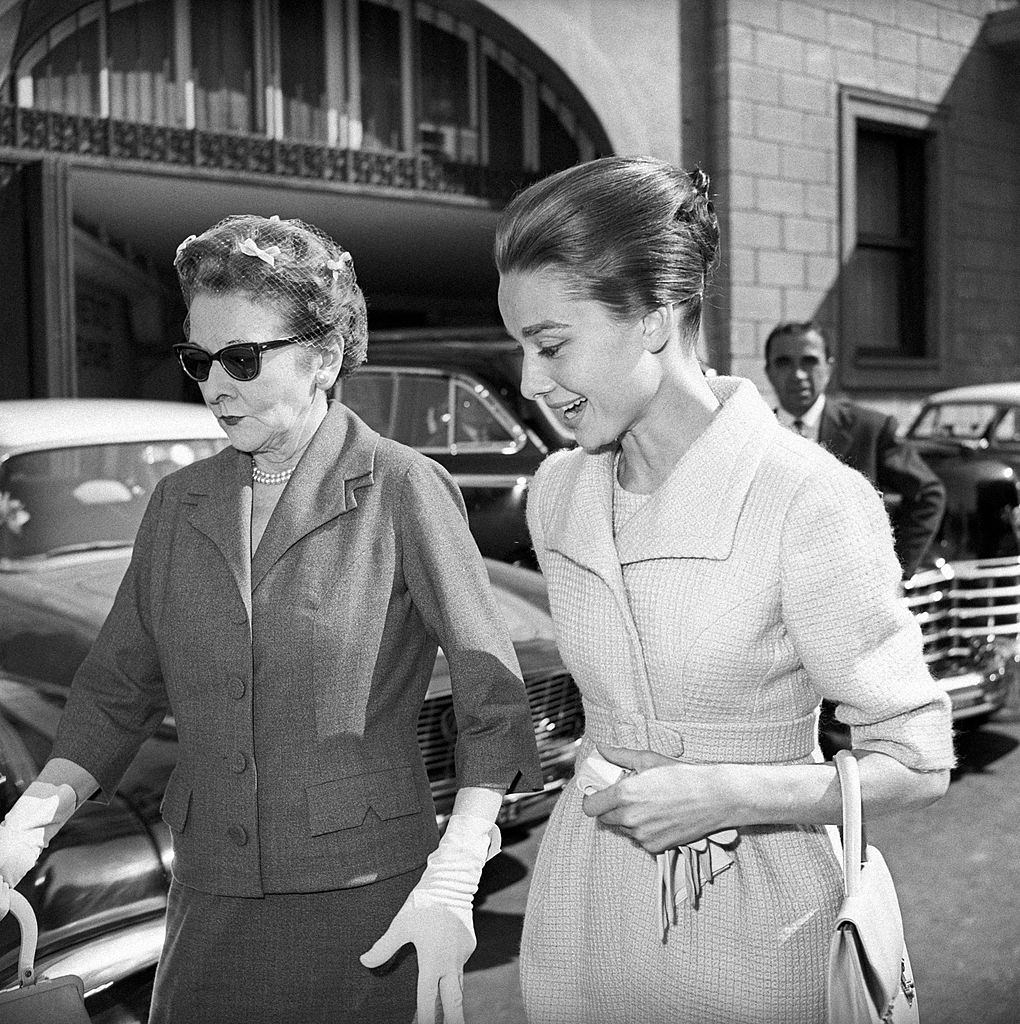 Audrey Hepburn walking with her mother, the Dutch baroness Ella Van Heemstra. Rome, 1950s.