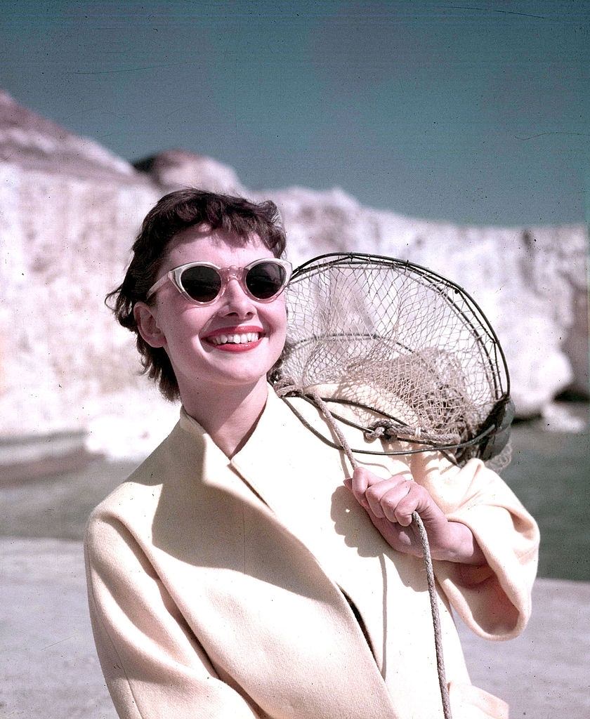 Audrey Hepburnon the beach at Rottingdean, East Sussex, 1951.