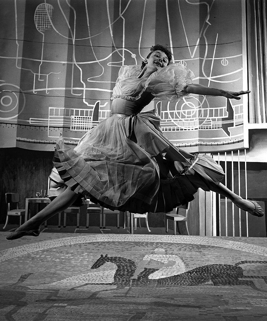 Audrey Hepburn dancing on the set of the film "The Secret People"