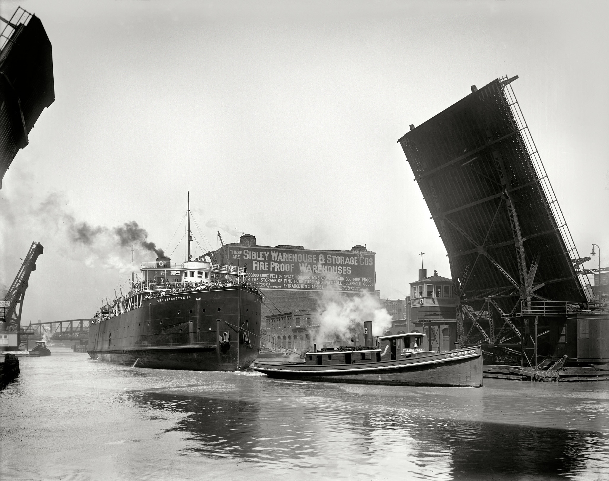 Pere Marquette transfer boat 18 passing State Street bridge, The Chicago River circa 1910