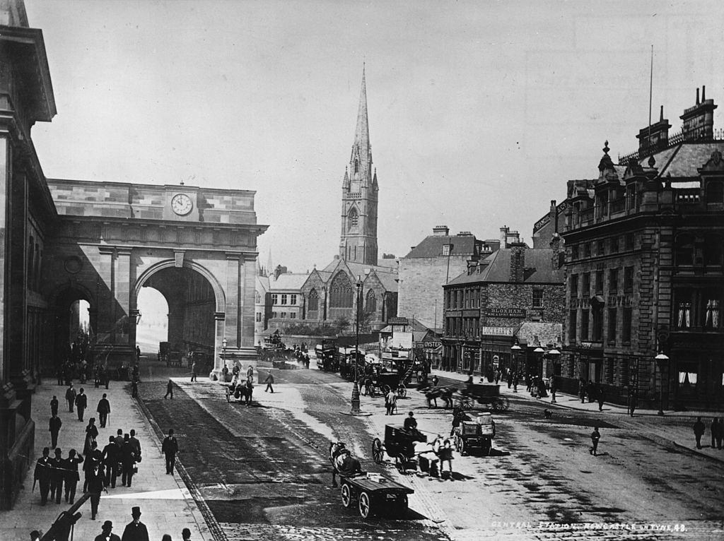 The entrance to Central Station and in the background, St Mary's church and spire, Newcastle-on-Tyne, 1900
