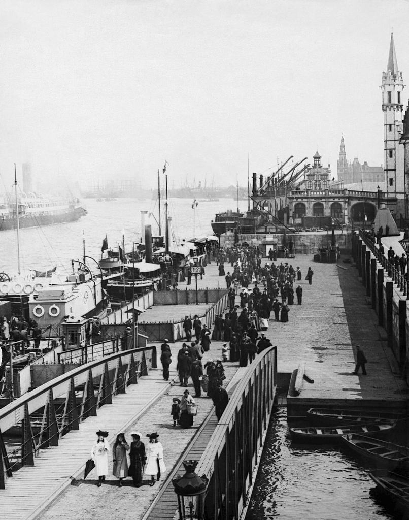 The docks and promenade along the River Scheldt, Antwerp, Belgium, circa 1900.