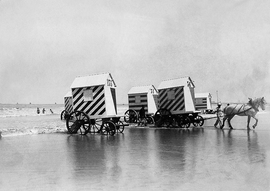 Bathing machine were transporting by horse-drawn carriage to the beach, Belgium, 1904.