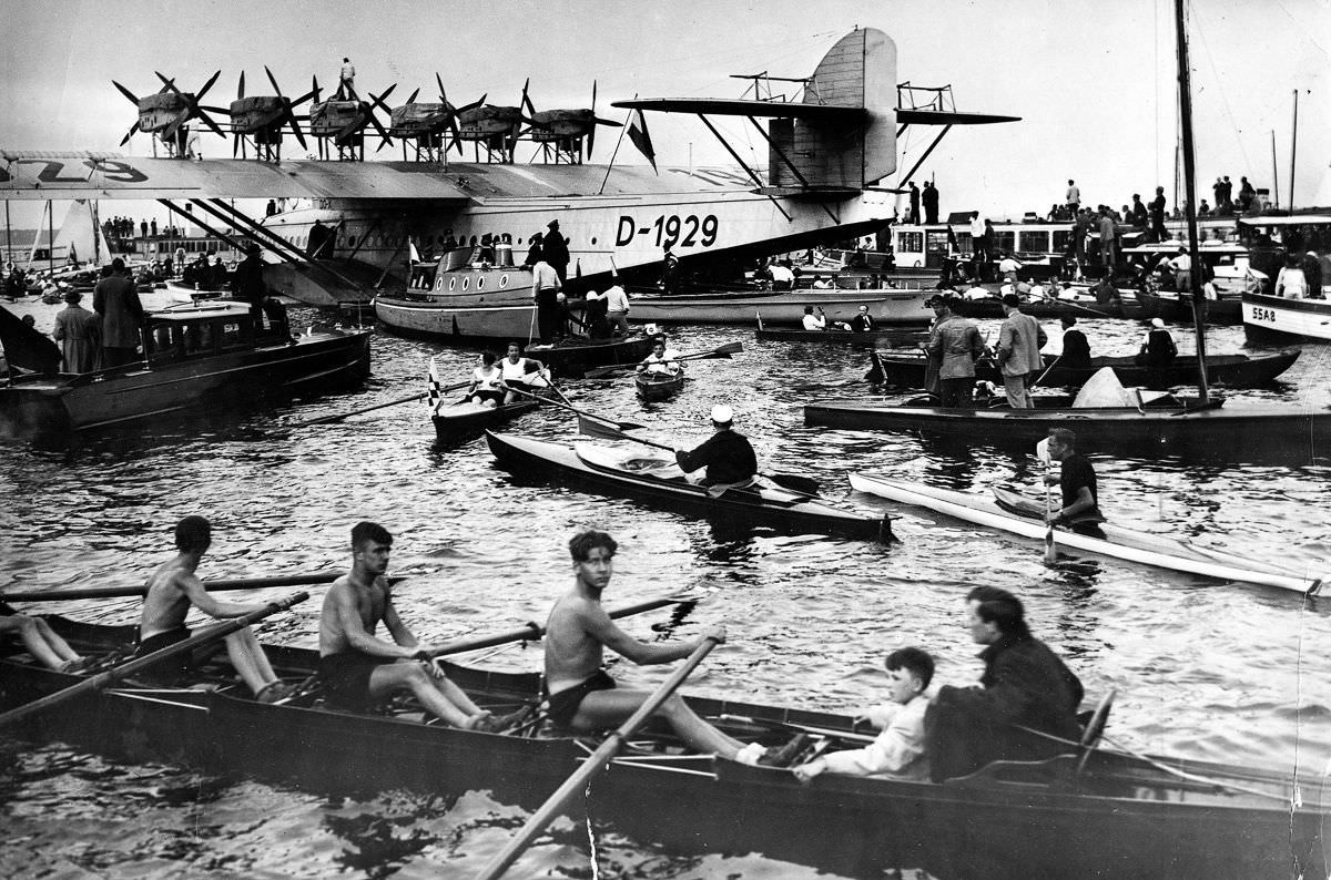 Spectators gather around the flying boat on Lake Müggelsee in Berlin,May 24, 1932