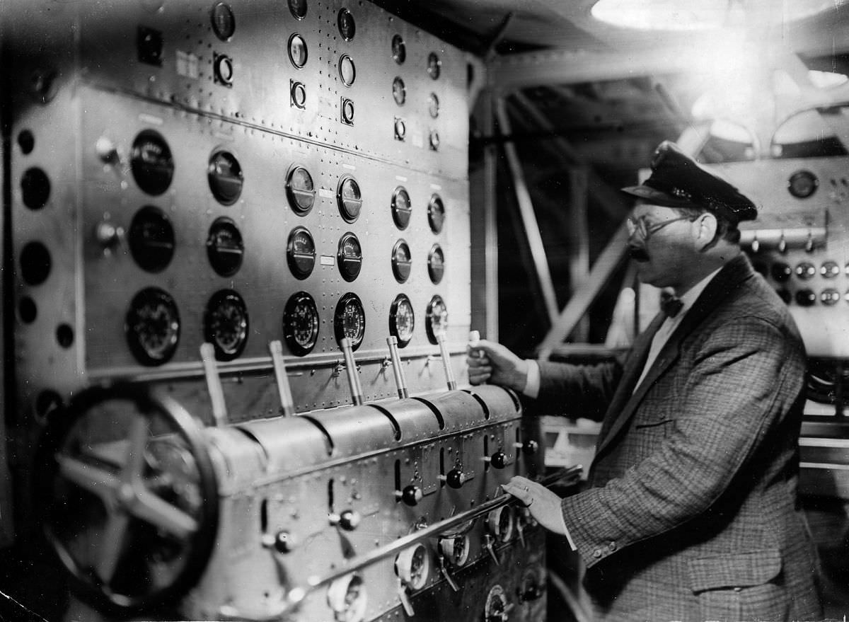 A machinist in the flying boat’s engine room,July 25, 1929