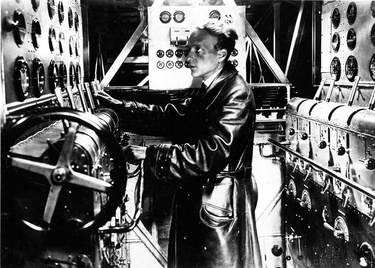 A machinist in the engine room of the flying boat,Oct. 21, 1929