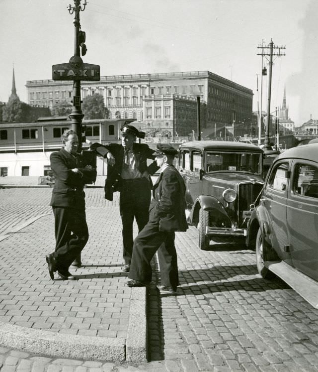 Taxi drivers outside the Grand Hotel.