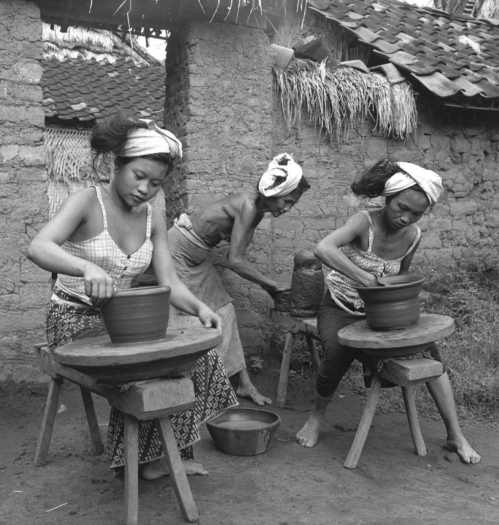 Women turning pots by hand in Bali, 1954.