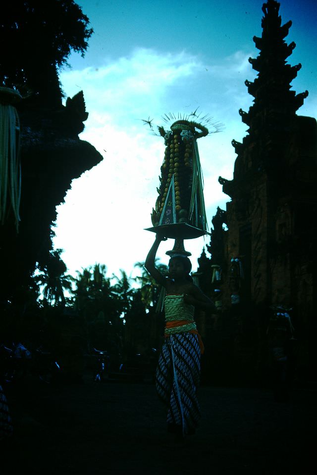 Coming from temple - New Year in Bali, 1952